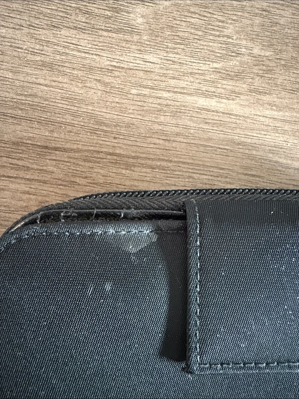 Prada Bifold  Black Zip-Around Card Wallet with Silver Triangle Emblem